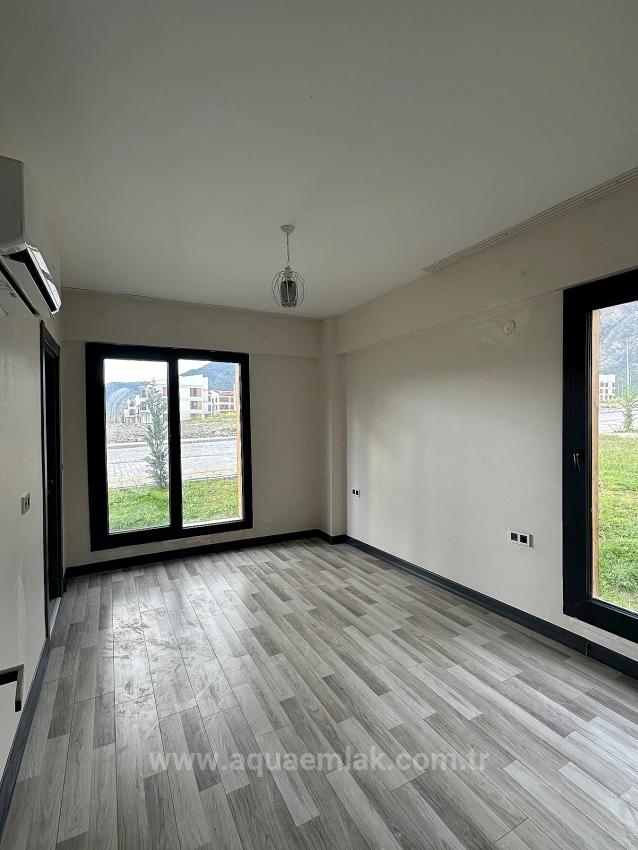 2+1-Zimmer-Wohnung In Köyceğiz Zu Vermieten, Erdgeschoss, Alle Zimmer Klimatisiert, In Einer Wohnanlage Mit Zugangskontrolle.