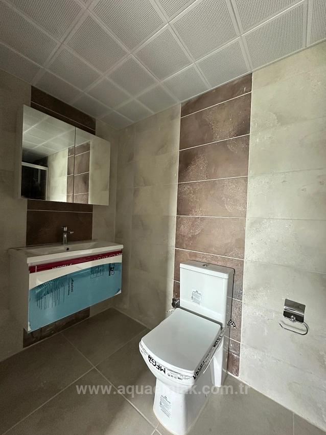 3+1-Zimmer-Wohnung In Köyceğiz Zu Vermieten, Erdgeschoss, Alle Zimmer Klimatisiert, In Einer Wohnanlage Mit Zugangskontrolle.