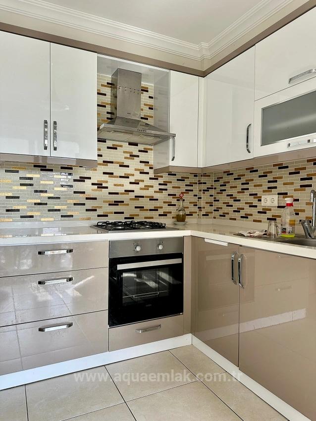 Apartment For Rent In Köyceğiz Town Center. Ground Floor, 2+1 Bedrooms, Closed Kitchen & Air Conditioning.