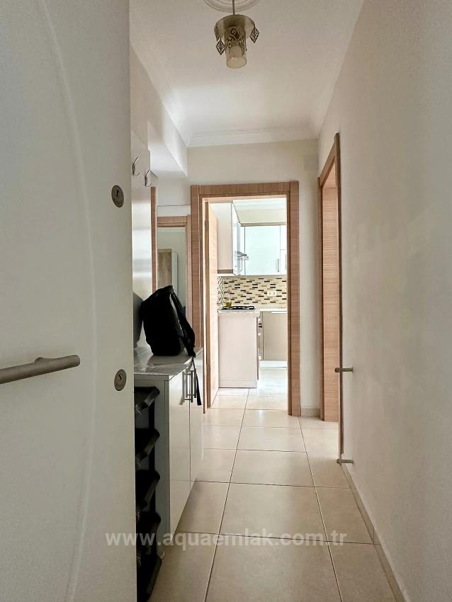 Сдается Квартира В Центре Города Кёйджегиз. Первый Этаж, 2+1 Спальни, Отдельная Кухня И Кондиционер.