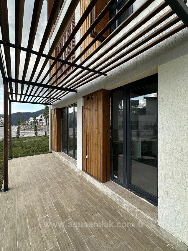 Köyceğiz De Site İcinde Bahçe Kat Tum Odalari Klimali 2+1 Kiralik Daire